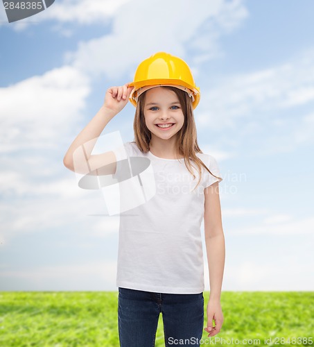 Image of smiling little girl in protective helmet