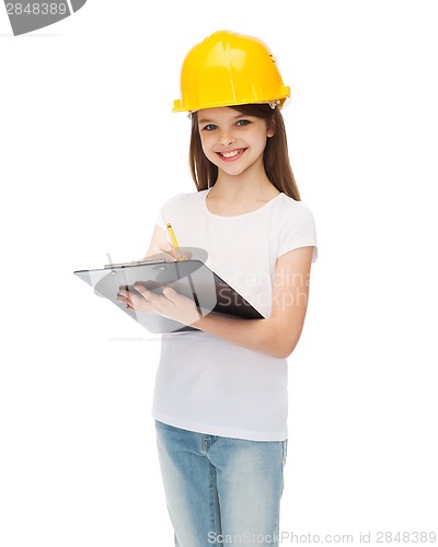 Image of smiling little girl in protective helmet