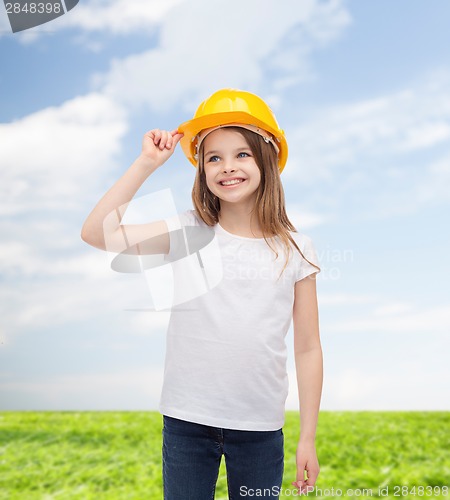 Image of smiling little girl in protective helmet
