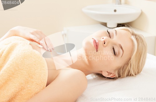 Image of beautiful woman in spa salon