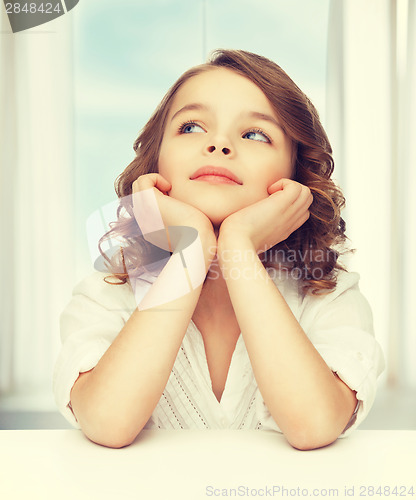 Image of pre-teen girl in casual clothes