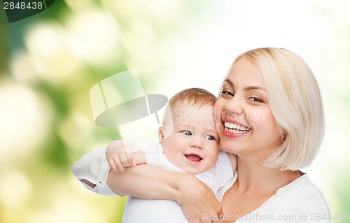 Image of happy mother with smiling baby