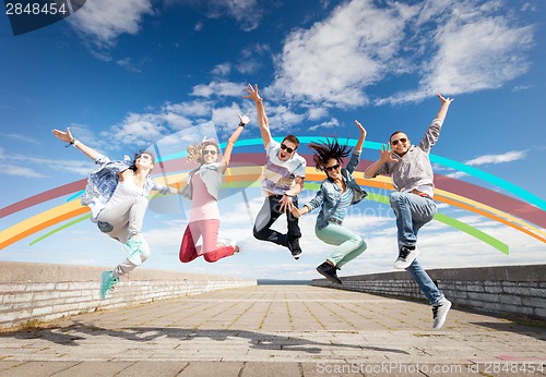 Image of group of teenagers jumping