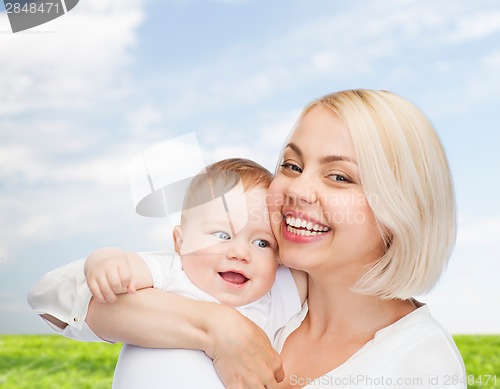 Image of happy mother with smiling baby