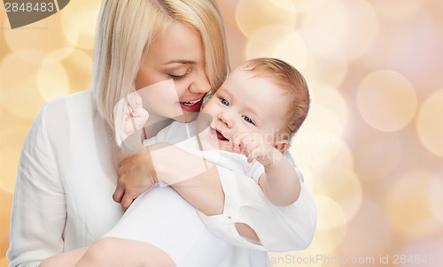 Image of happy mother with smiling baby