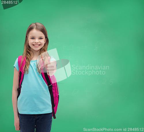 Image of smiling girl with school bag showing thumbs up