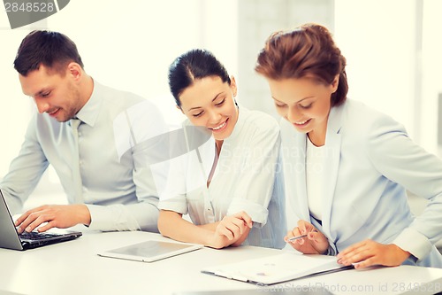 Image of business team working in office