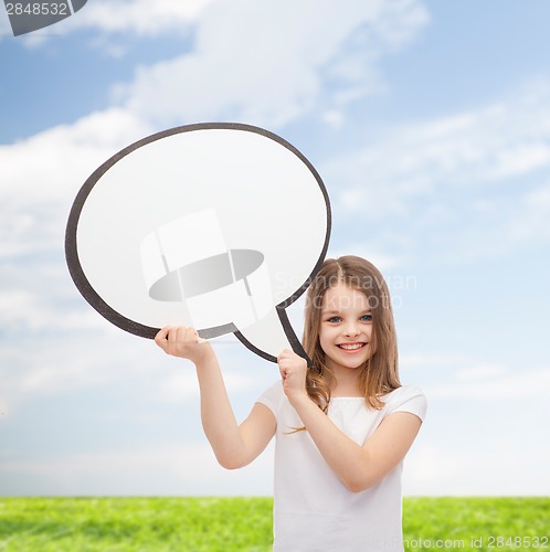 Image of smiling little girl with blank text bubble