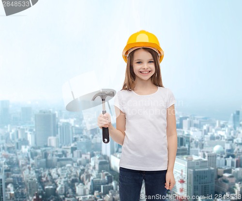 Image of smiling little girl in protective helmet