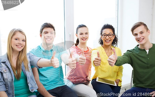 Image of students with tablet pc computers at school