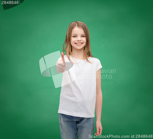 Image of girl in blank white t-shirt showing thumbs up