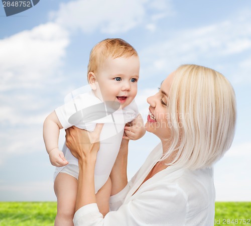 Image of happy mother with smiling baby