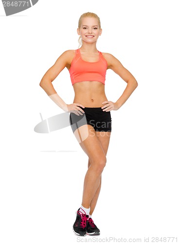 Image of beautiful athletic woman in sportswear