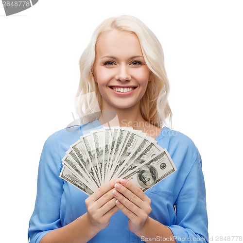 Image of smiling girl with dollar cash money