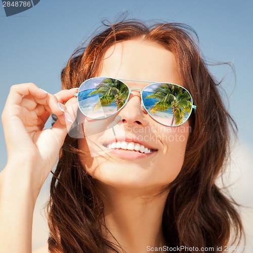 Image of woman in sunglasses