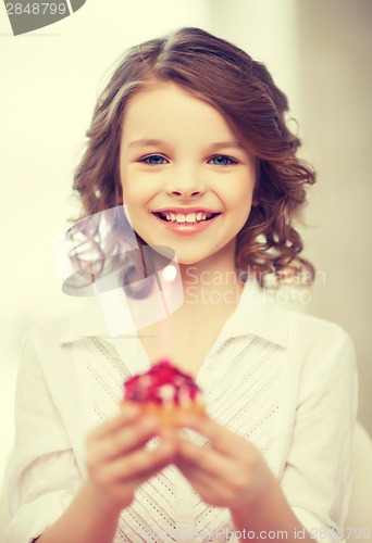 Image of girl with cupcake