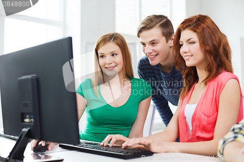 Image of group of smiling students having discussion