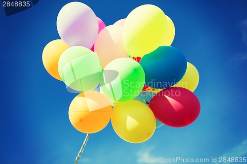 Image of lots of colorful balloons in the sky