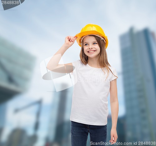 Image of smiling little girl in protective helmet