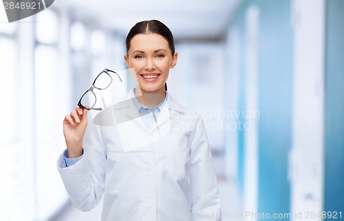 Image of smiling female doctor without stethoscope