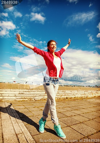 Image of beautiful dancing girl in movement