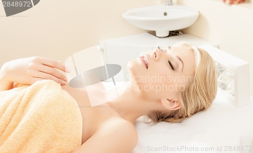 Image of beautiful woman in spa salon