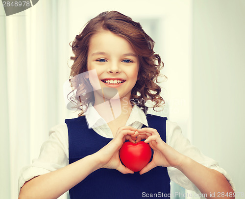 Image of girl with small heart