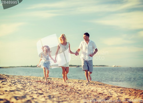 Image of happy family at the seaside