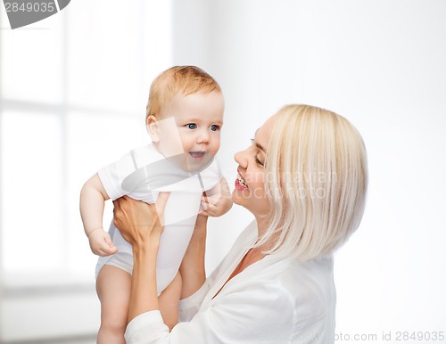 Image of happy mother with smiling baby