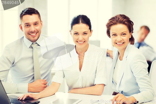 Image of business team working in office