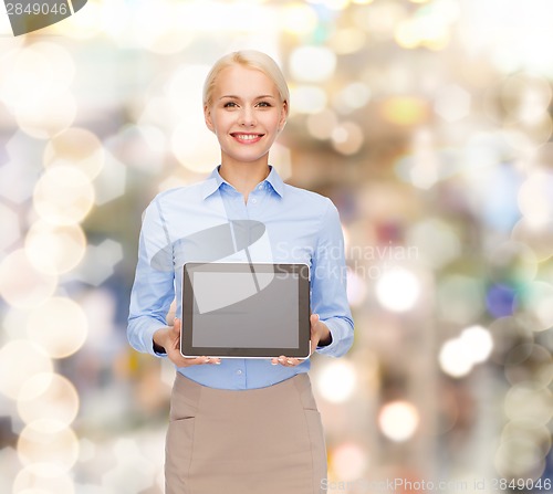 Image of businesswoman with blank black tablet pc screen