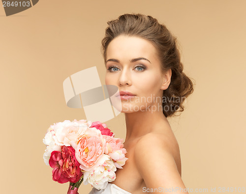 Image of woman with bouquet of flowers