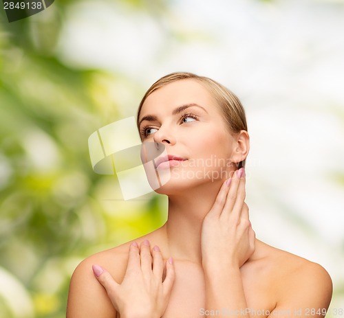 Image of face and hands of beautiful woman