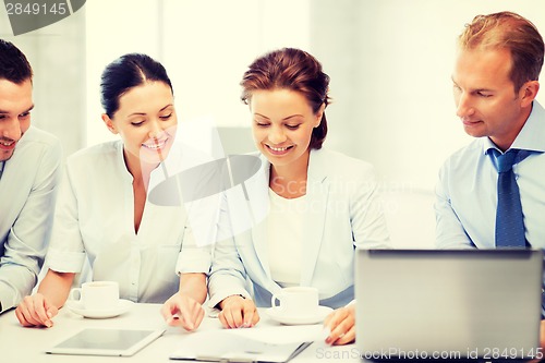 Image of business team having discussion in office