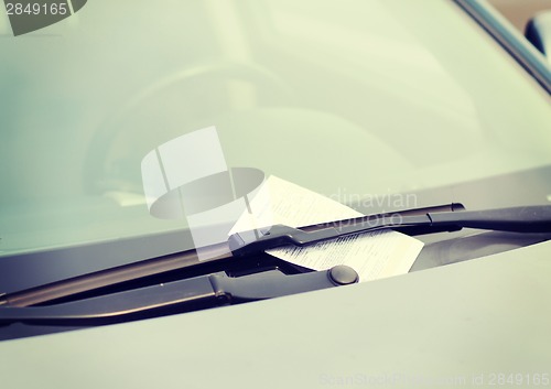 Image of parking ticket on car windscreen