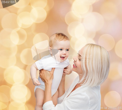 Image of happy mother with smiling baby