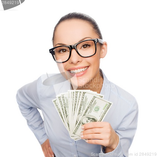 Image of smiling businesswoman with dollar cash money