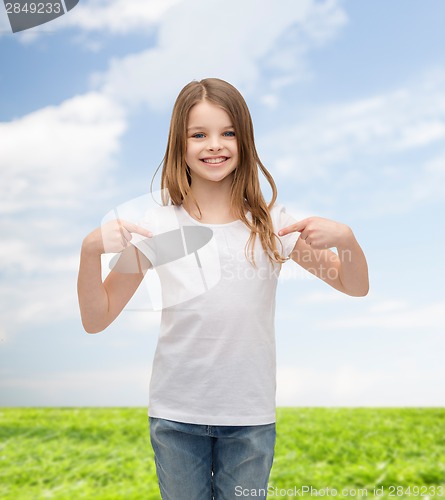 Image of smiling little girl in blank white t-shirt