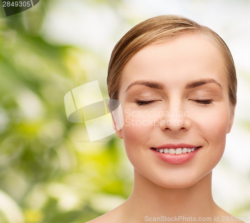 Image of face of beautiful woman with closed eyes