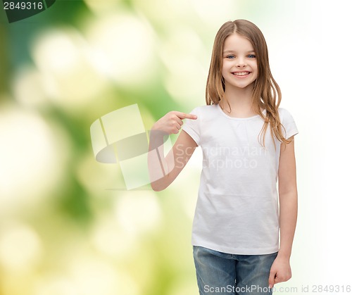 Image of smiling little girl in blank white t-shirt