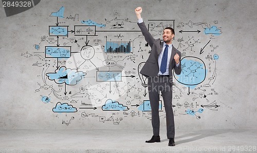 Image of happy businessman with hands up