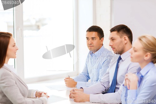 Image of businesswoman at interview in office