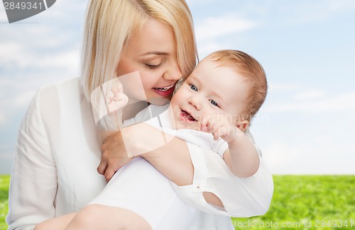 Image of happy mother with smiling baby