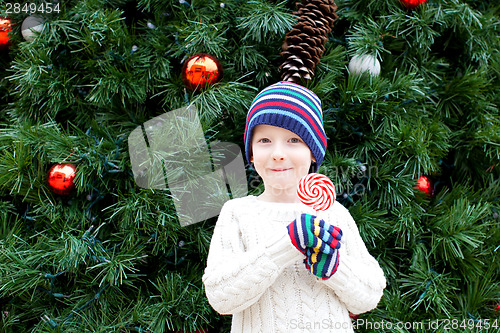 Image of kid at christmas time