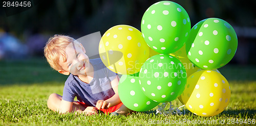 Image of boy with balloons