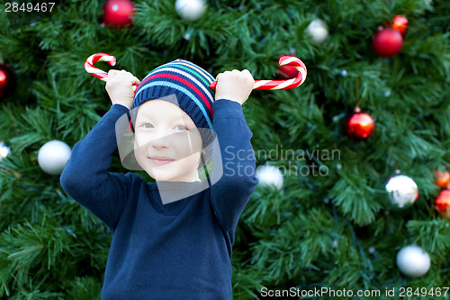 Image of kid at christmas time