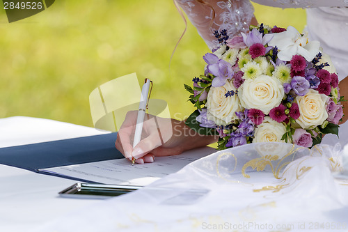 Image of bride signed contract