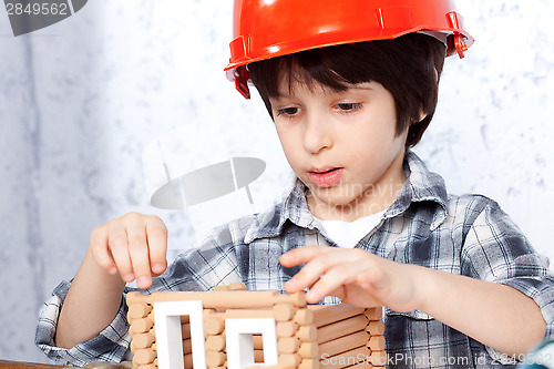 Image of boy built a new house