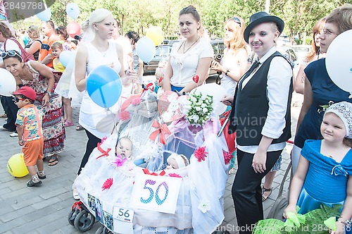 Image of Participants of the contest of babyish strollers