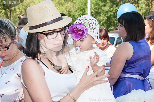 Image of Participants of the contest of babyish strollers